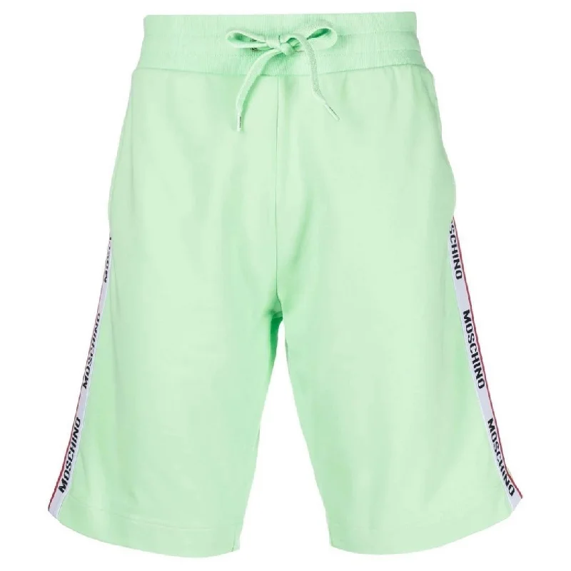 Men's ripped denim shorts for a trendy streetwear aestheticMoschino Branded Tape Legs Green Shorts