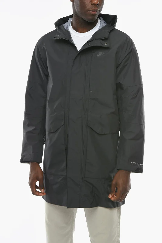 Men coats made from recycled materials for an eco - friendly choiceNike Solid Color Parka with Hood and Hidden Closure